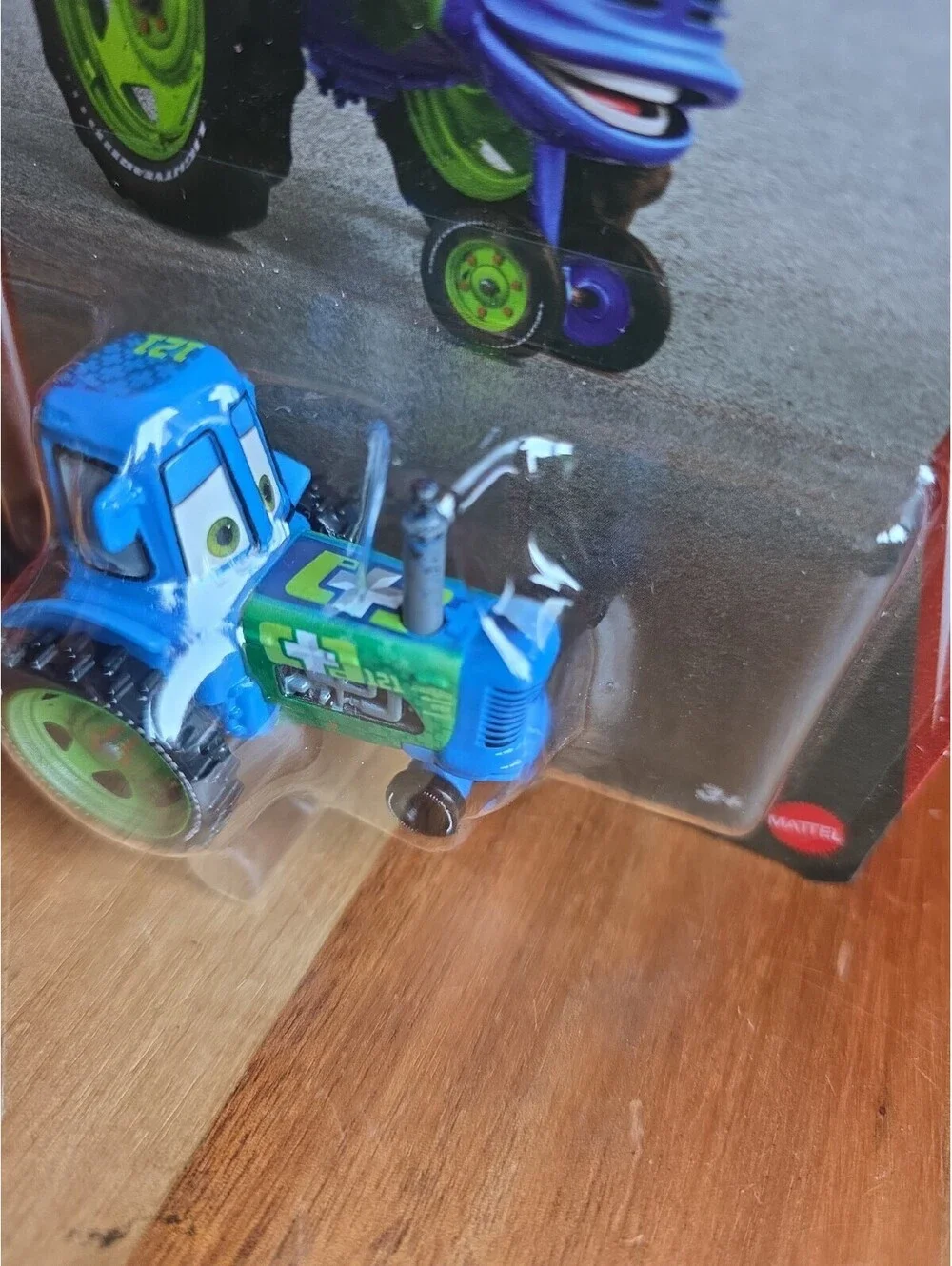 Disney Pixar Cars Clutch Aid Racing Tractor 20th New NIP